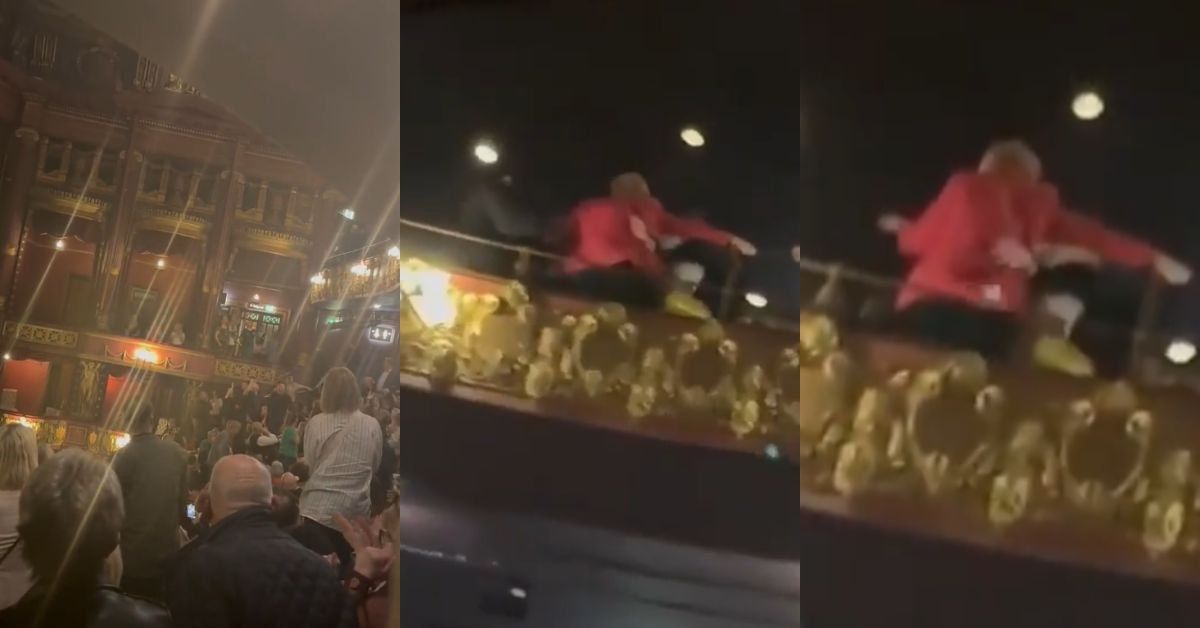 Screenshots of a woman being yanked from her balcony seat inside the theater
