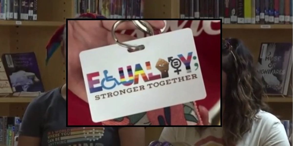NextImg:Teachers spark outcry by wearing 'equality' badges with 'black power' fist, pride flag colors