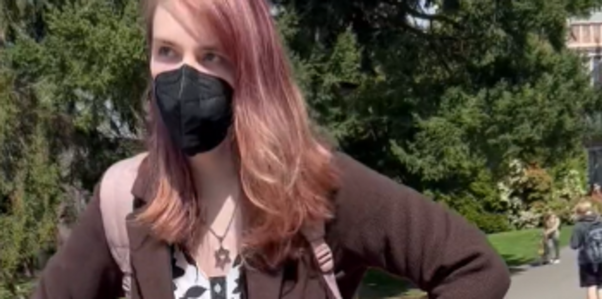 NextImg:Raging transgender activist caught on video flipping Turning Point USA table at University of Washington: 'Get the f*** off my campus, you Nazi!'
