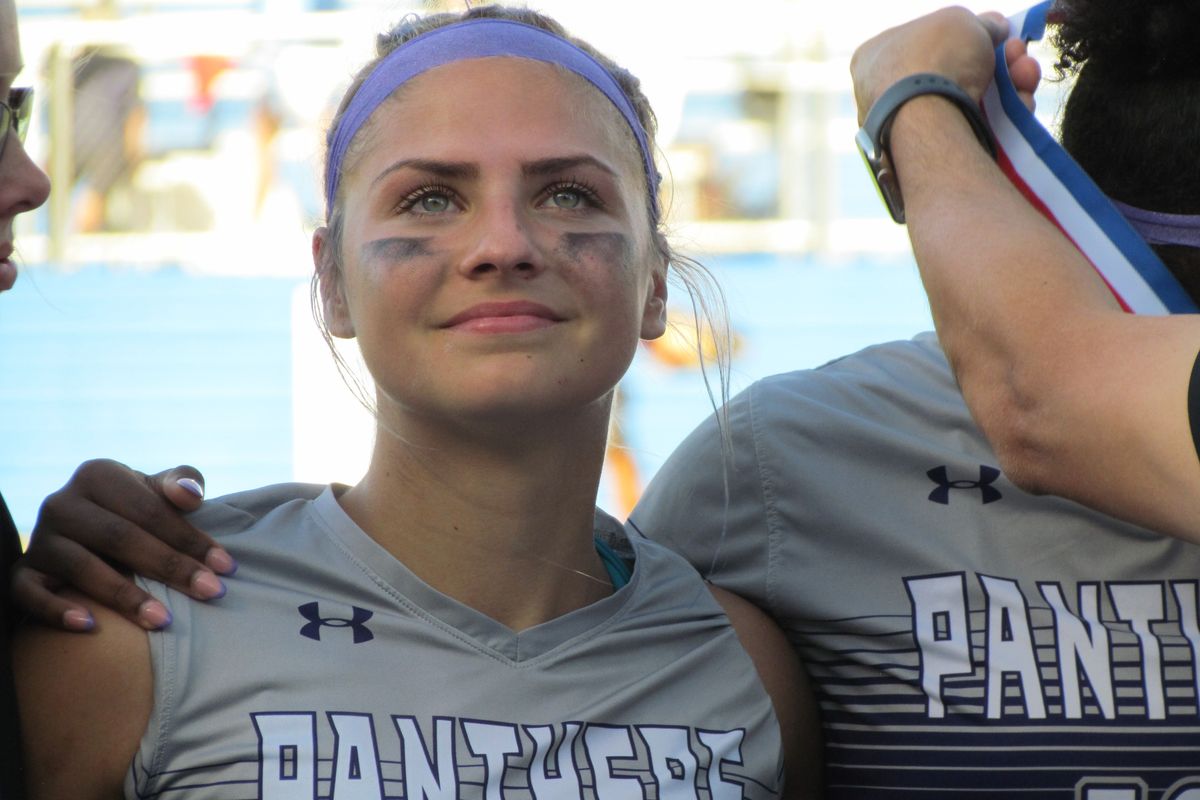 HEADS HELD HIGH: Ridge Point's Warnken reminds her team of their historic journey