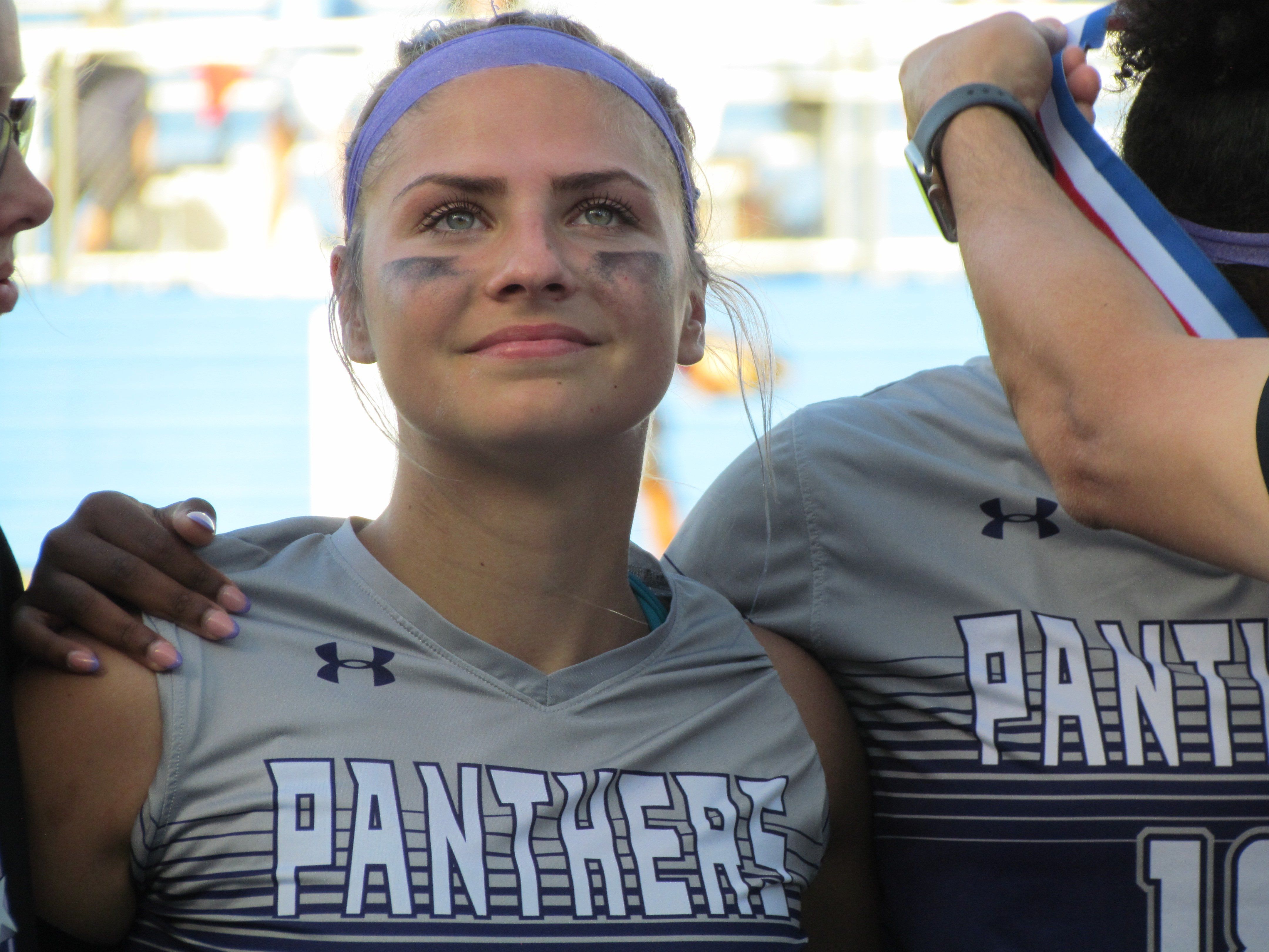 HEADS HELD HIGH: Ridge Point's Warnken reminds her team of their historic journey