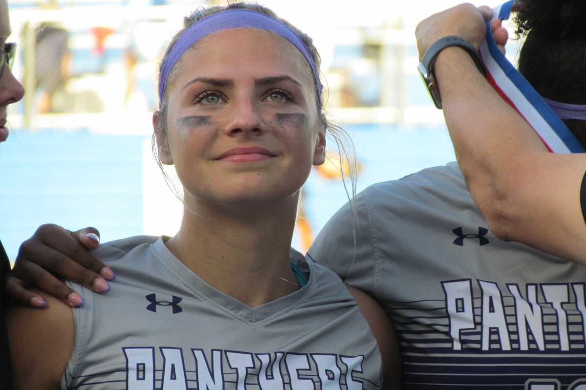 HEADS HELD HIGH: Ridge Point's Warnken reminds her team of their historic journey