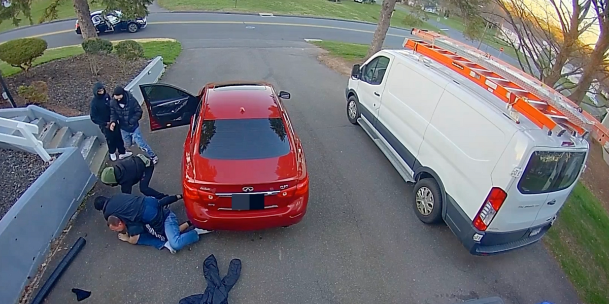 NextImg:Video: Man fights off four suspected, would-be carjackers in his driveway