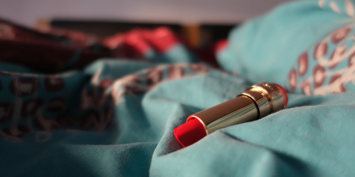 Lipstick on bedsheets