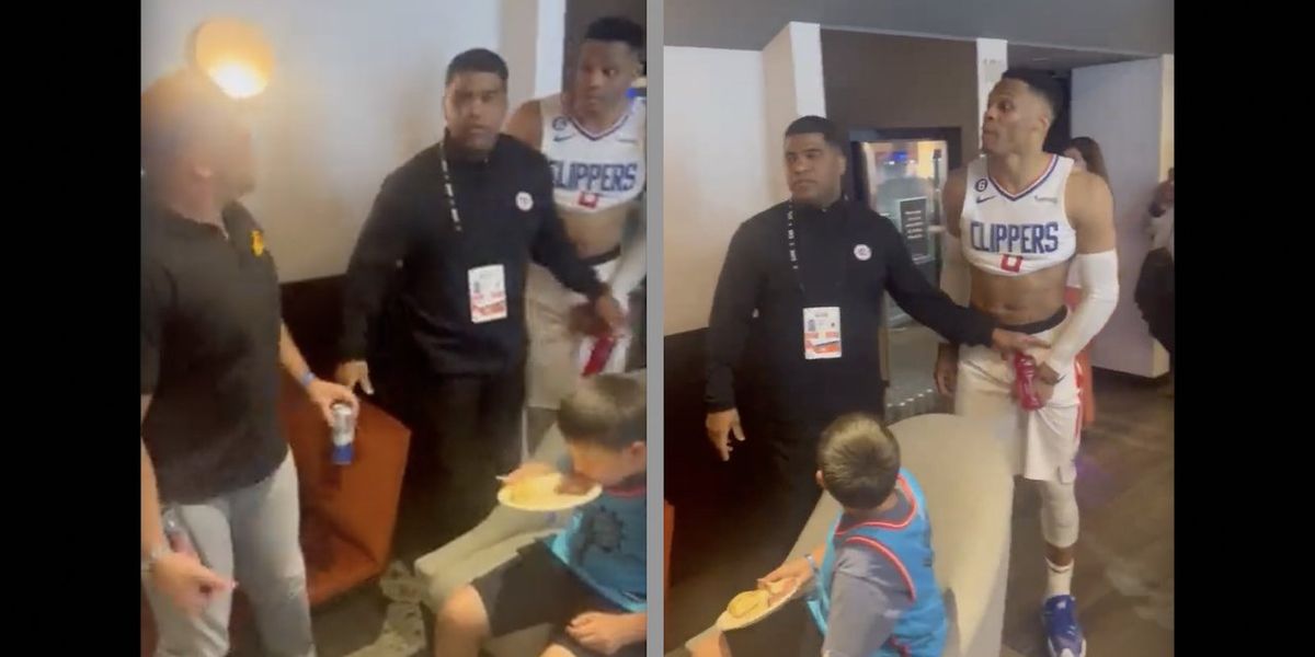 NextImg:'Watch your mouth, motherf***er': NBA star Russell Westbrook gets in fan's face at halftime while young boy — apparently fan's son — watches
