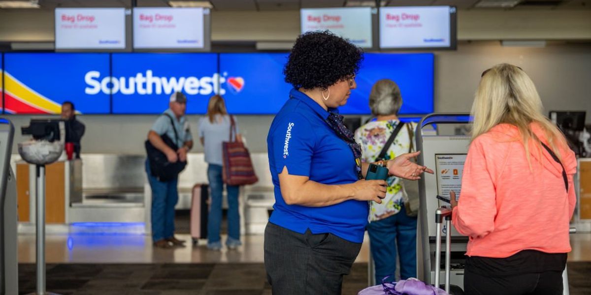 NextImg:Southwest system outage causes 1,700 flight delays, leaving some passengers stranded on runways — latest meltdown has travelers vowing to ditch airline
