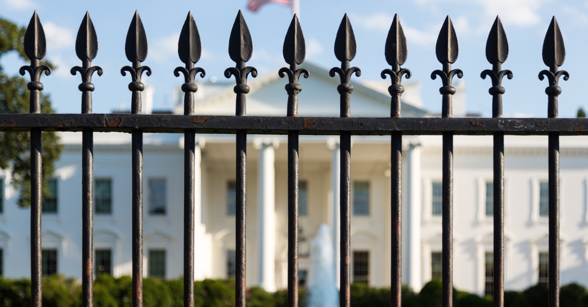 Main entrance of White House seen through railings