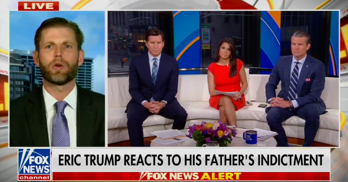 Eric Trump appears on a Fox News broadcast alongside 3 Fox News hosts. The lower third graphic reads "Eric Trump reacts to his father's indictment."