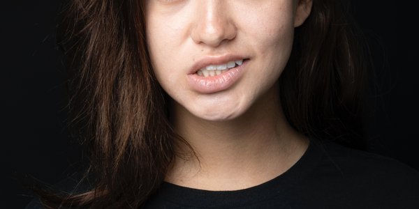 Woman looking regretful