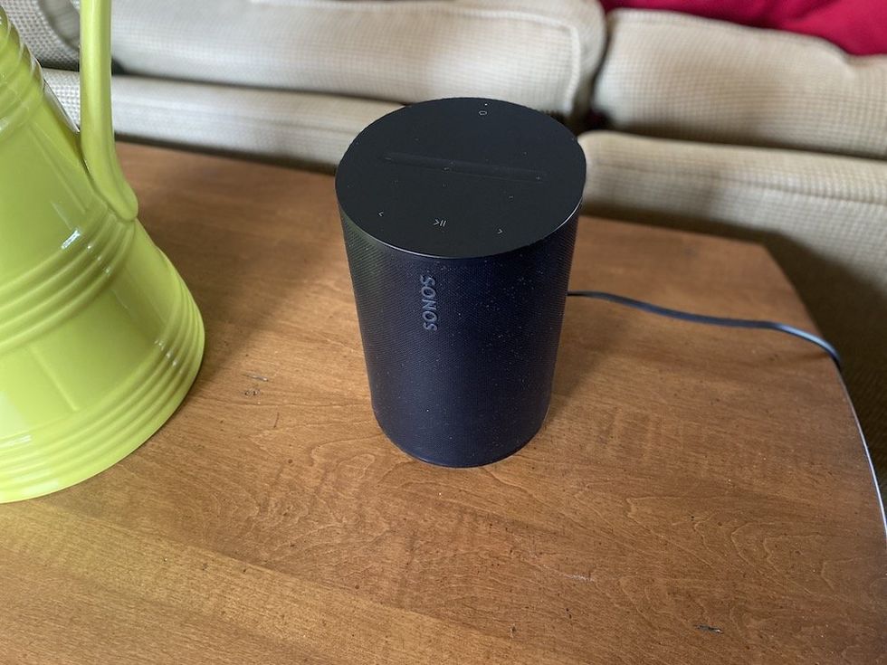 a photo of Sonos Era 100 Smart Speaker on a table