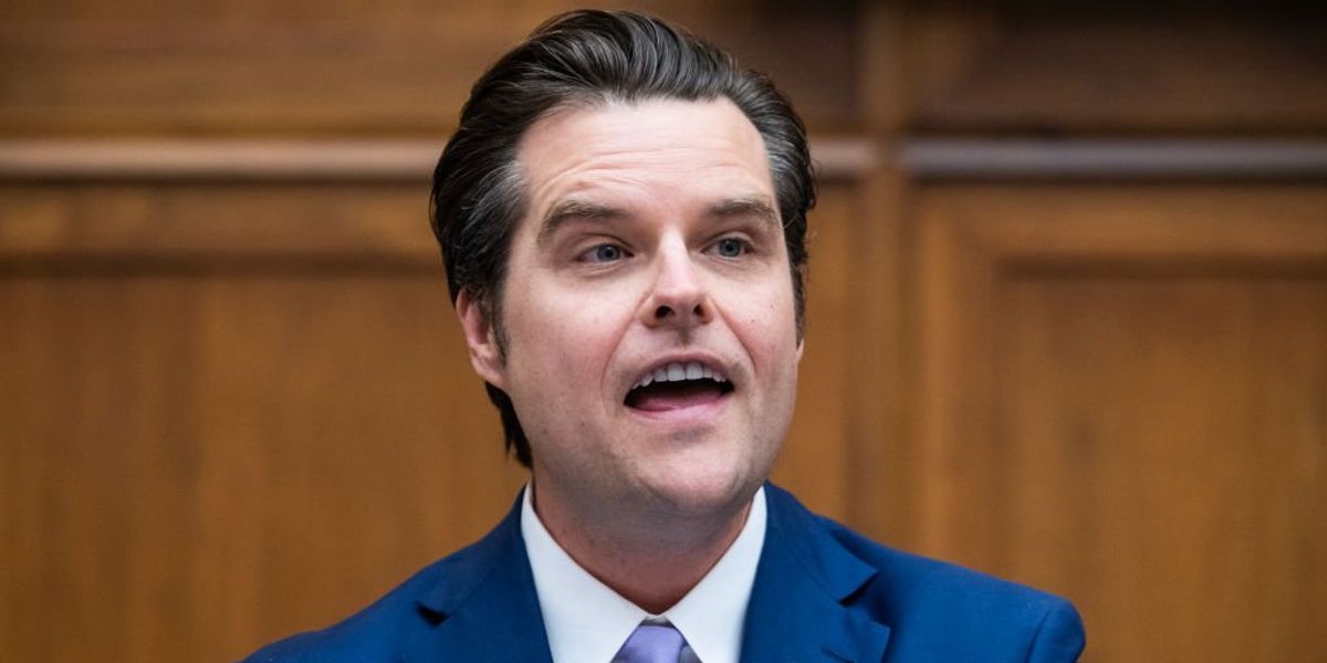 Matt Gaetz says a woman threw a drink on him