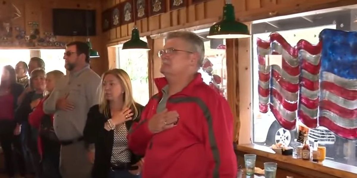 NextImg:Viral TikTok video shows Americans singing the national anthem at a restaurant in California, and liberals are 'terrified'
