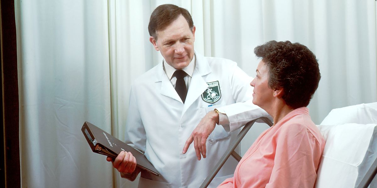 Doctor consulting with patient