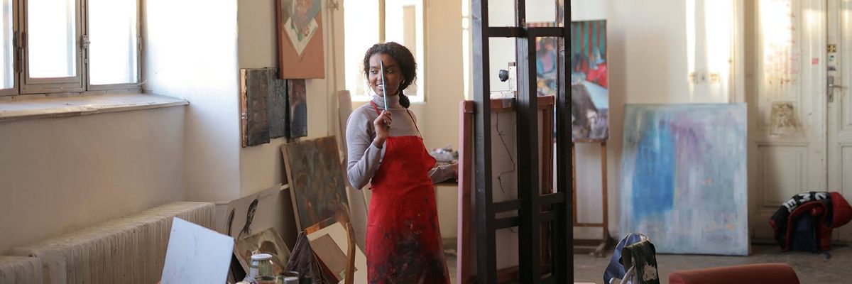 girl painting in a studio