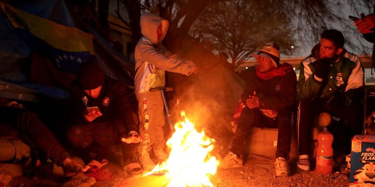 NextImg:Migrants' tents set ablaze; Mexican agency official blames migrants' frustration over CBP's mobile app