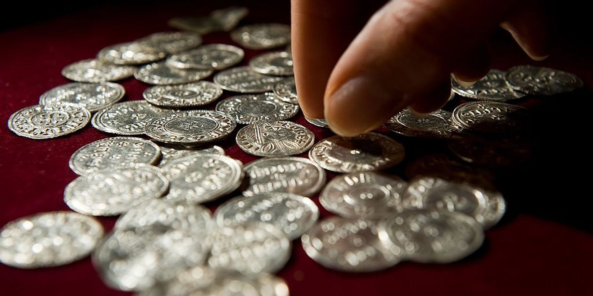 NextImg:Trove of 1,000-year-old Viking coins discovered by young girl who was metal detecting near fortress in Denmark
