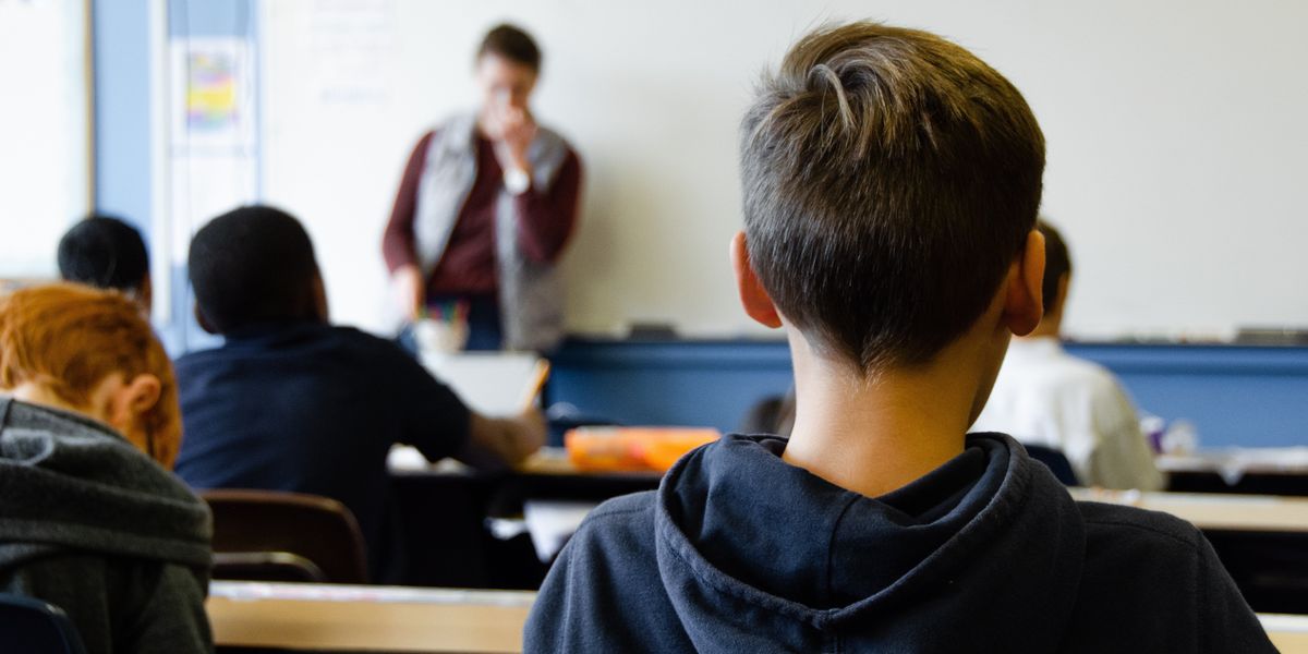 Teacher standing in front of a classroom