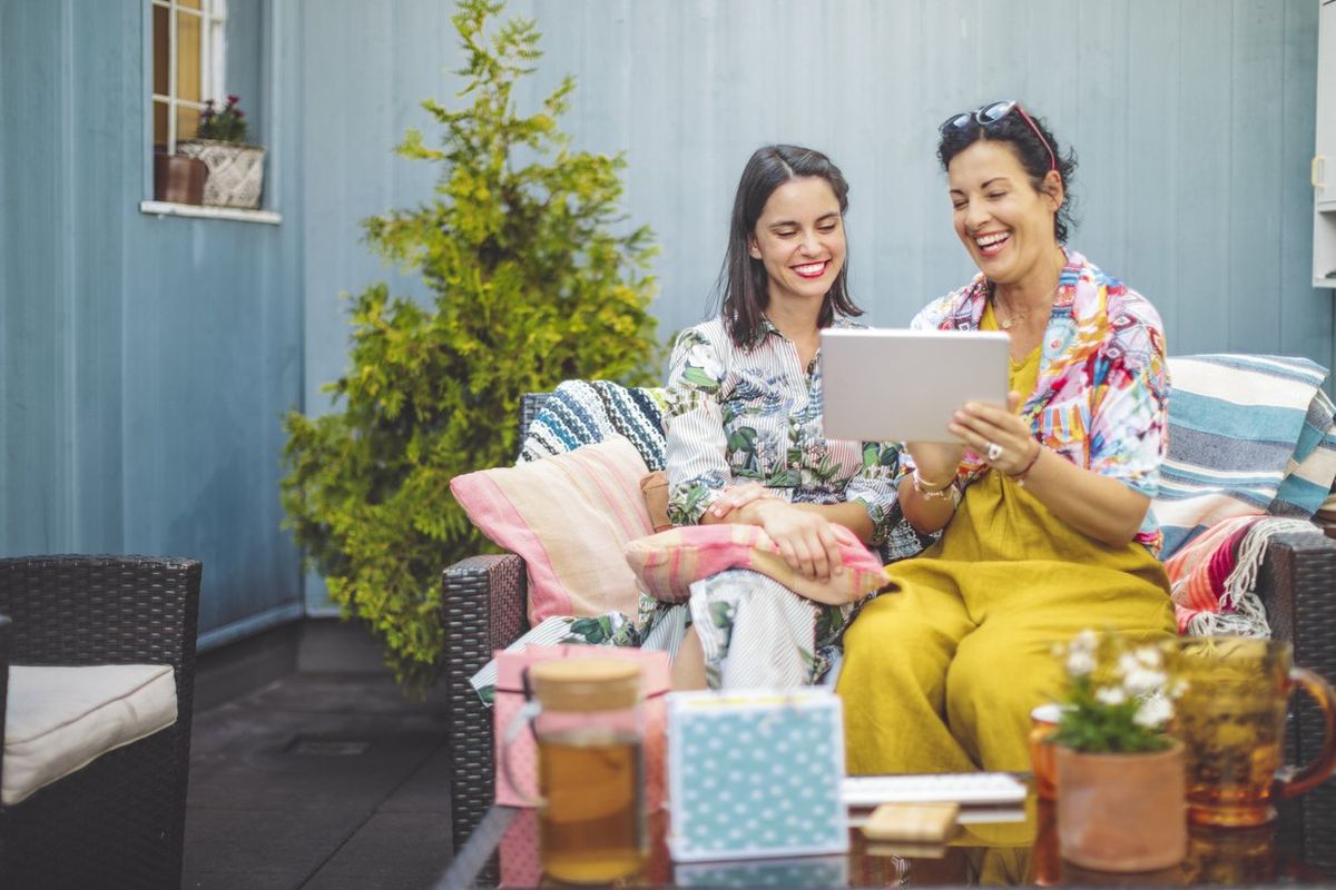  Mom and daughter buying gifts online together