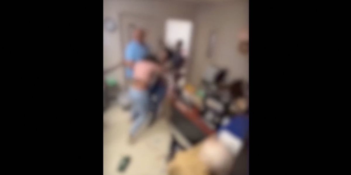 NextImg:'Come out, b***h! Open the door!' Woman arrested after fight inside high school involving students