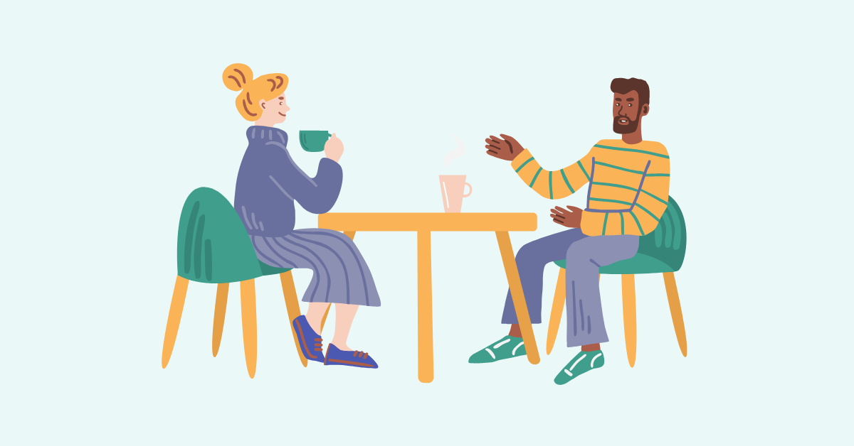 Two cartoon people talking as mentor and mentee