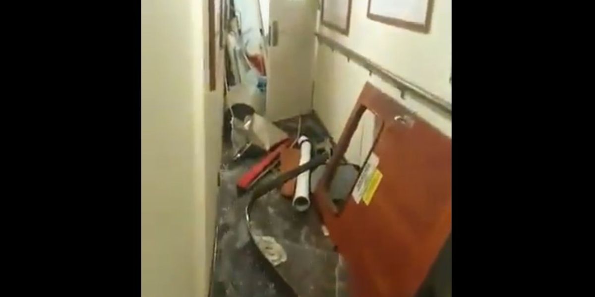 NextImg:Carnival cruise ship hammered by party-crashing winds and gargantuan waves