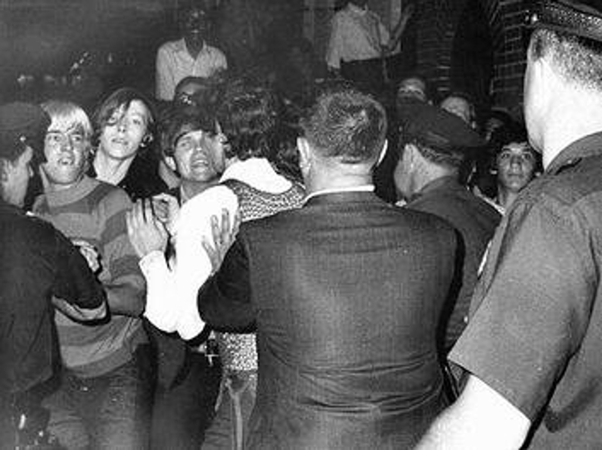 The only known photograph taken during the first night of riots, by freelance photographer Joseph Ambrosini, shows gay youth scuffling with police.