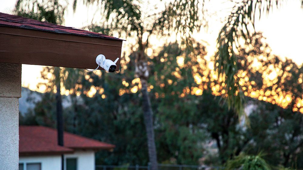 a photo of ​TP-Link Tapo C325WB Outdoor Security Camera with ColorPro Night Vision on a home 