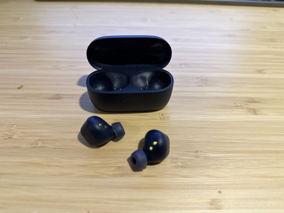 a photo of Jabra Elite 4 True Wireless Earbuds outside of their charging case.