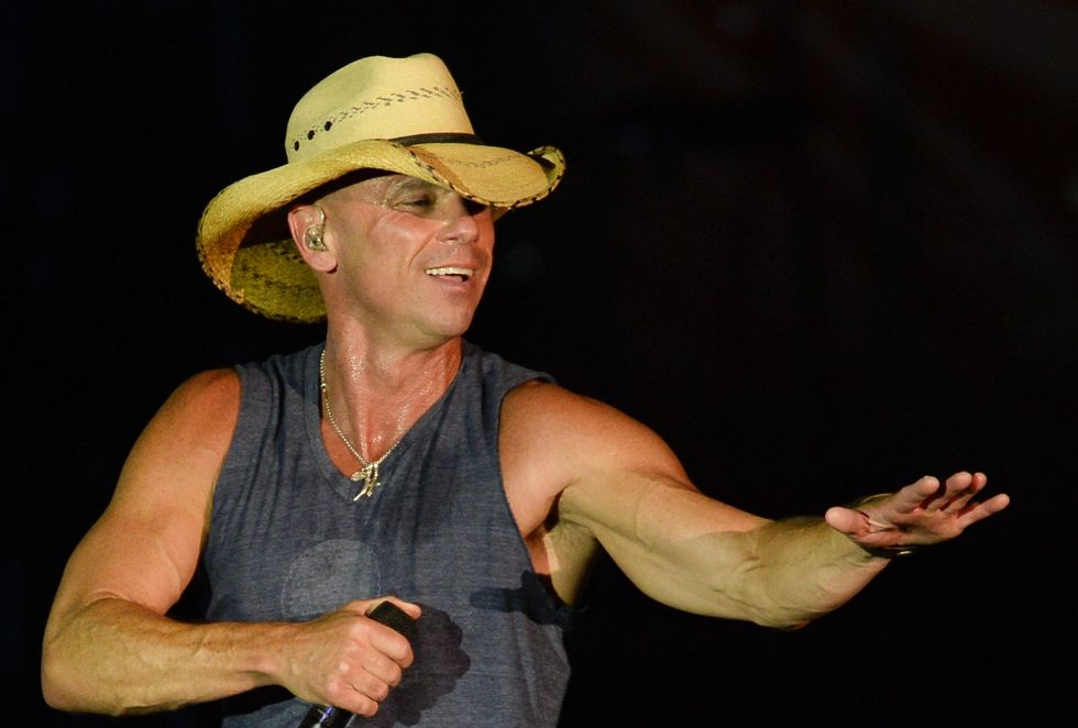 Kenny Chesney performing a show in Alabama.