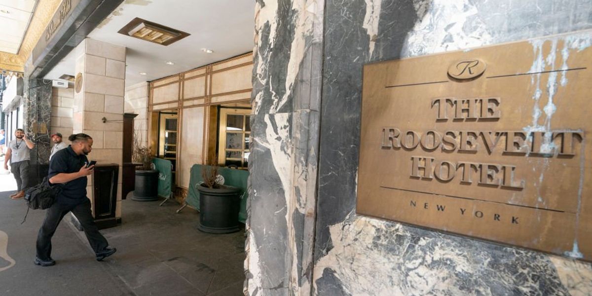 NextImg:Irate asylum-seeker bludgeons hotel worker over the head with ‘No Parking’ sign after being booted from shelter for disorderly conduct — then dodges arrest by fleeing scene on foot
