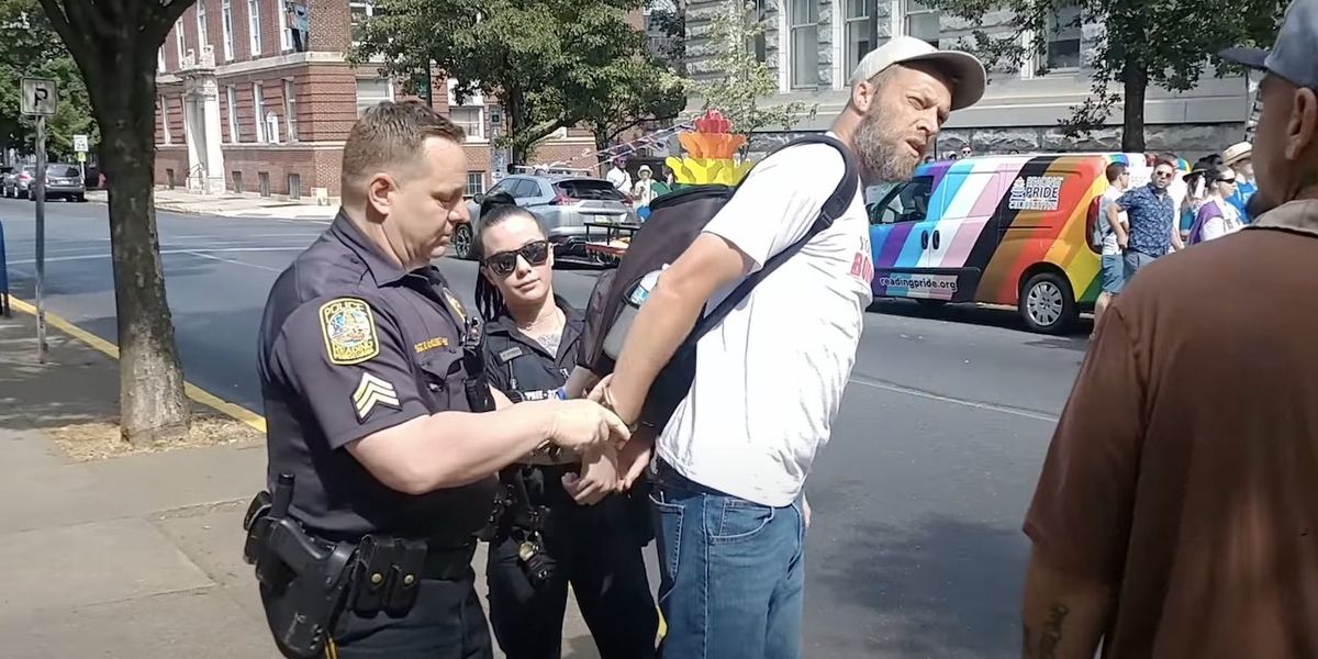 NextImg:'Sheer tyranny': Man arrested after trying to quote Bible to Pride-rally attendees — who applaud when he's put in handcuffs
