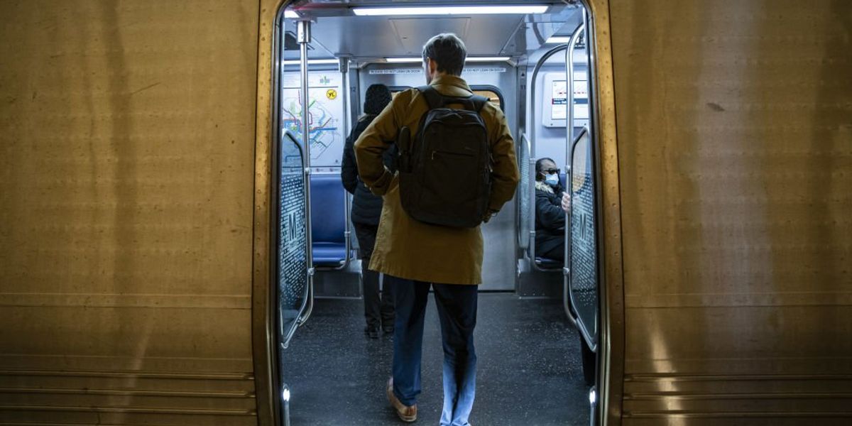 DC Metro's 'chief experience officer' apologizes after posting picture of a random commuter's groin to Twitter, complaining about 'manspreading'