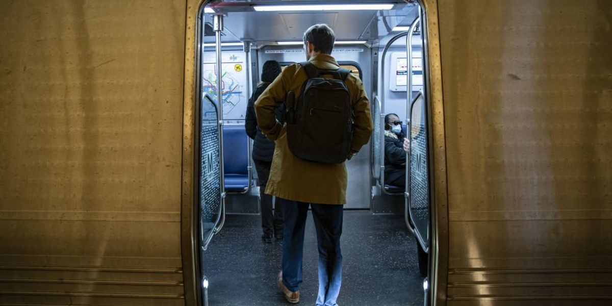 NextImg:DC Metro's 'chief experience officer' apologizes after posting picture of a random commuter's groin to Twitter, complaining about 'manspreading'