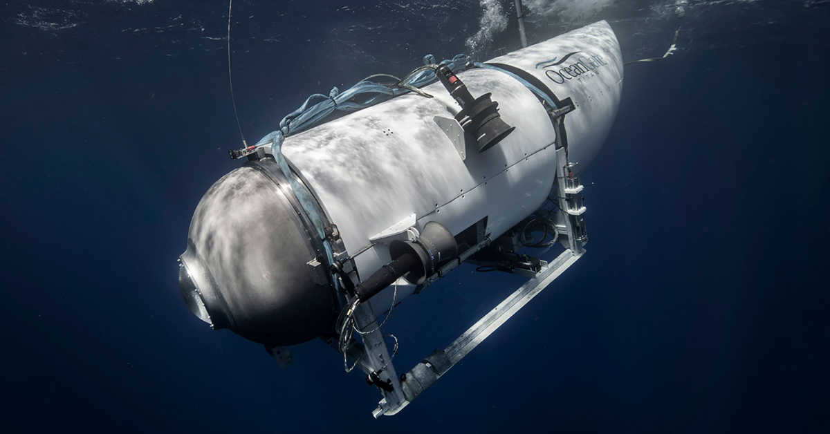 A file photo from OceanGate depicts the Titan submersible descending in the ocean
