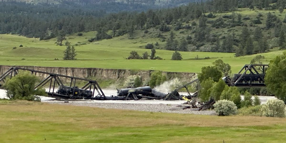 NextImg:Train derails into Yellowstone River; bridge collapses; tanker cars leaking asphalt, sulfur