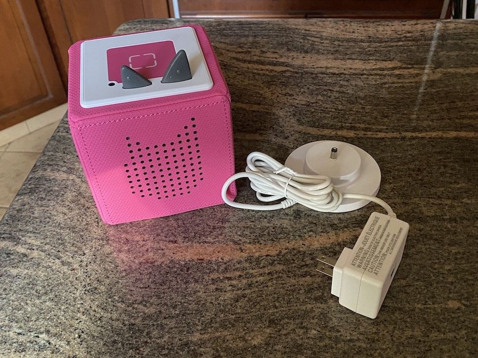 a photo of Toniebox and charging station