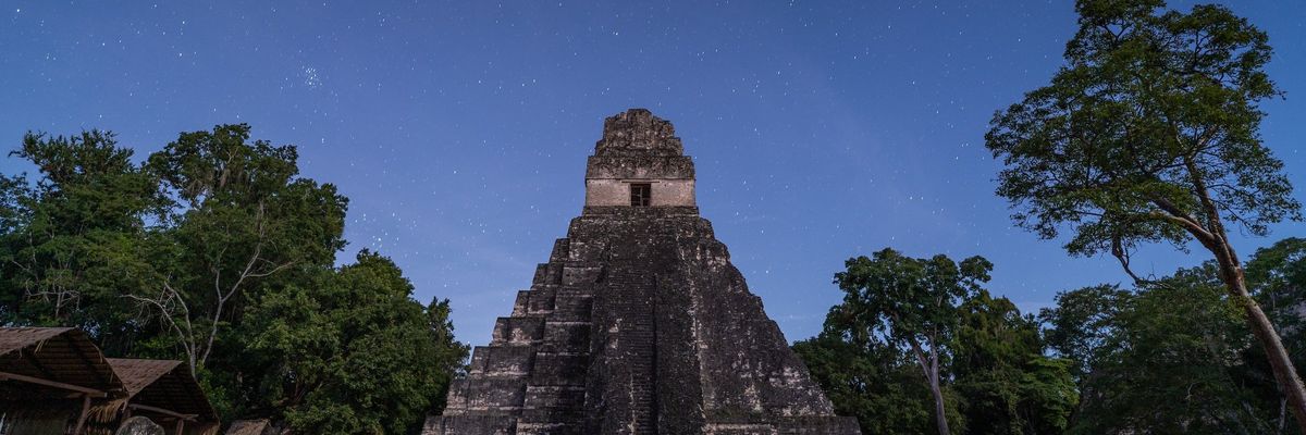 photograph of a stone pyramid in Tikal