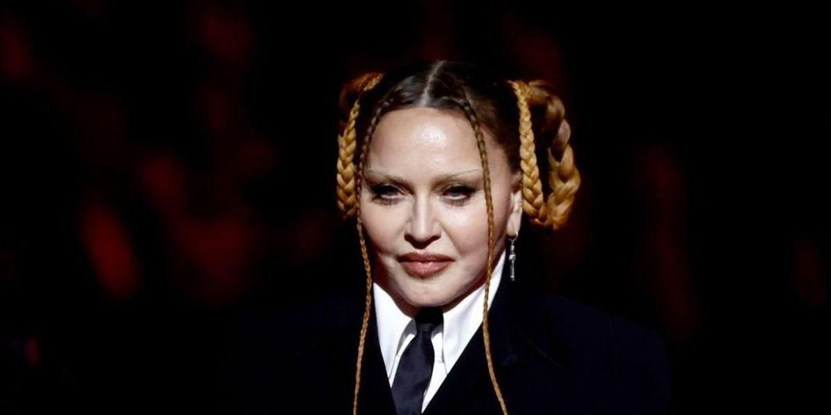NextImg:Madonna recovering in the hospital after contracting 'a serious bacterial infection,' her upcoming tour now on 'pause'