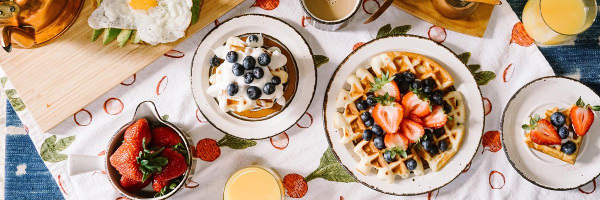 round white ceramic plate filled with waffle