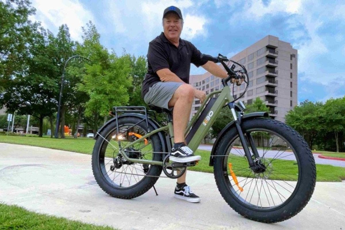 a photo of a man riding a KBO Tornado Electric Fat Tire Bike