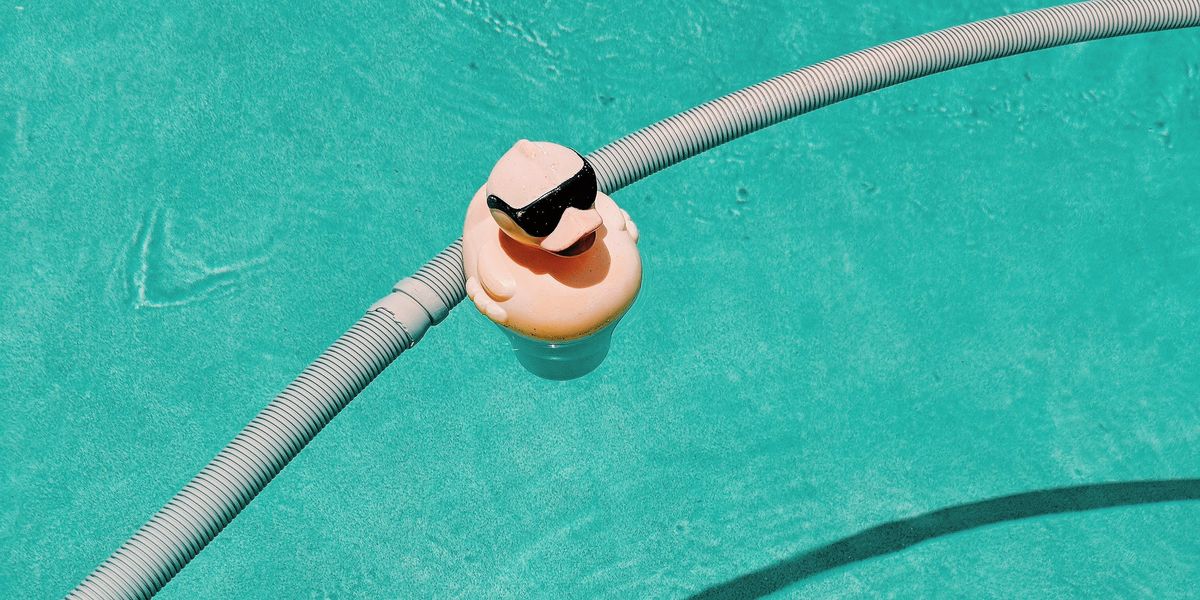 Rubber duckie with sunglasses in a pool
