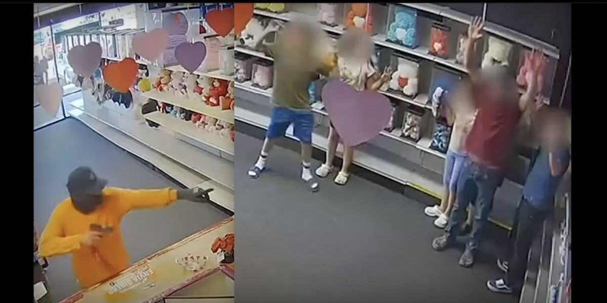 NextImg:Video: Masked thug holds children at gunpoint in toy store, steals cash; clerk says he 'prayed to God to help me because it was life or death'
