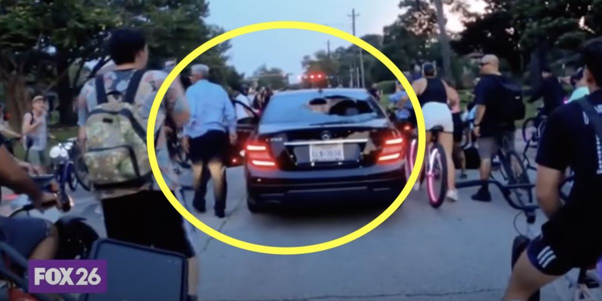 NextImg:Video: Mob of bicyclists surround car, smash windows with brick, chain as driver gets out to confront them. Cops arrest suspect.