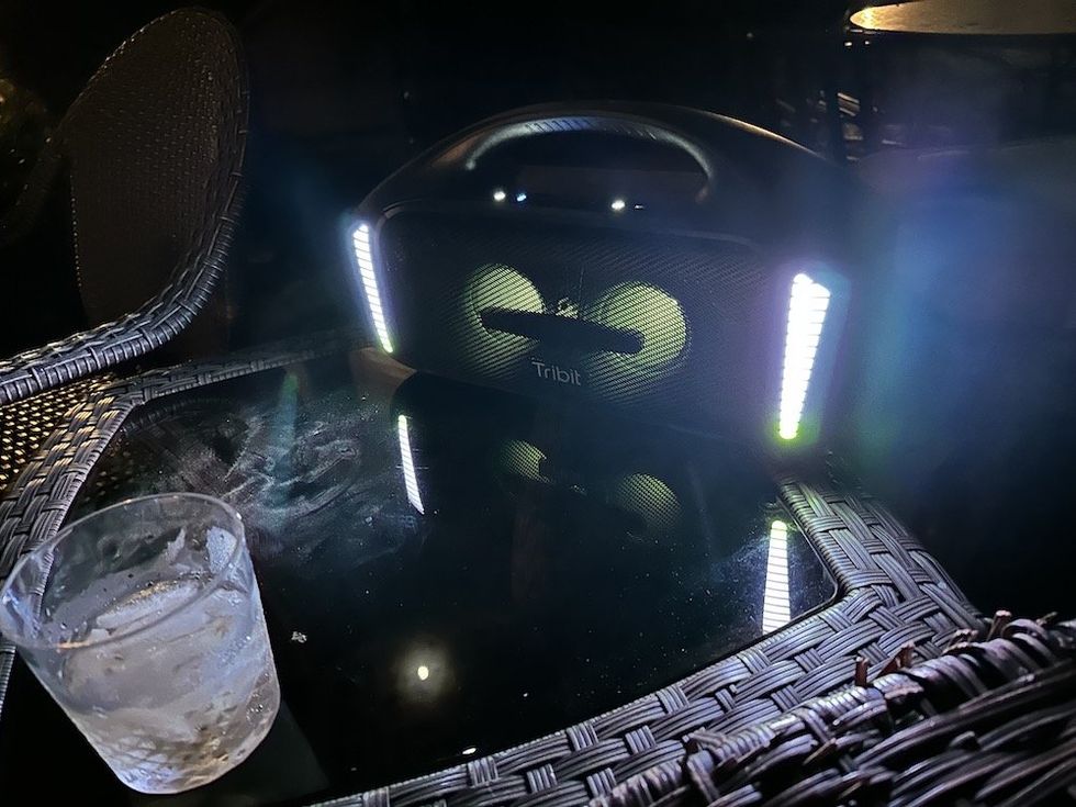 testing Stormbox Blast speaker outside at night with the lights on