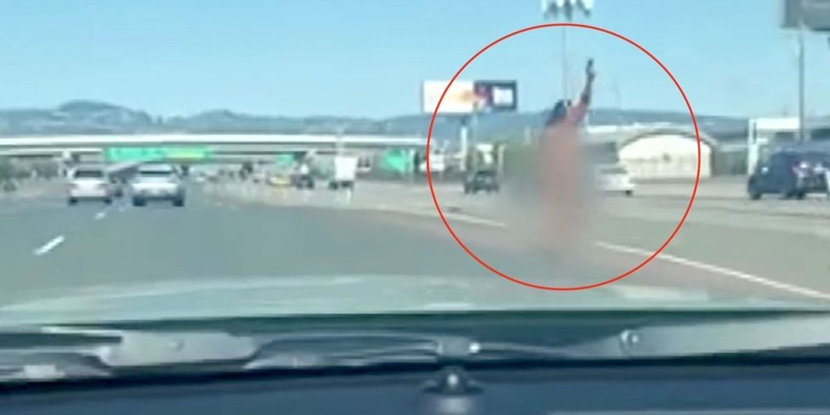 NextImg:Bizarre video shows naked woman shooting indiscriminately at cars on bridge in San Francisco