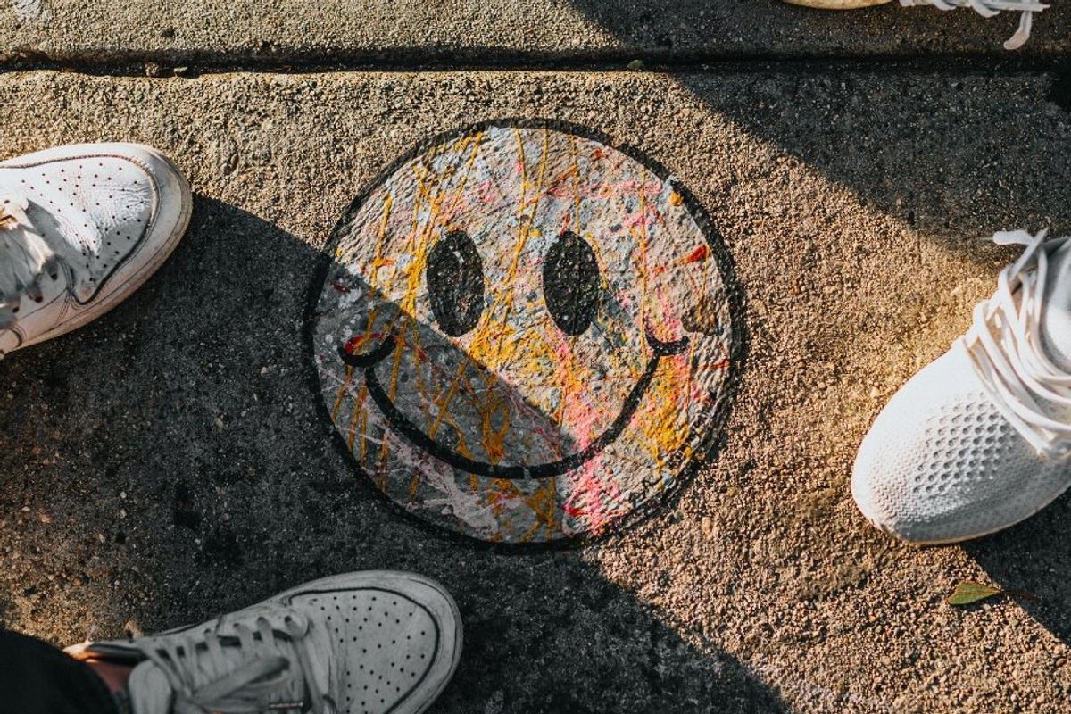 smiley face drawn in chalk
