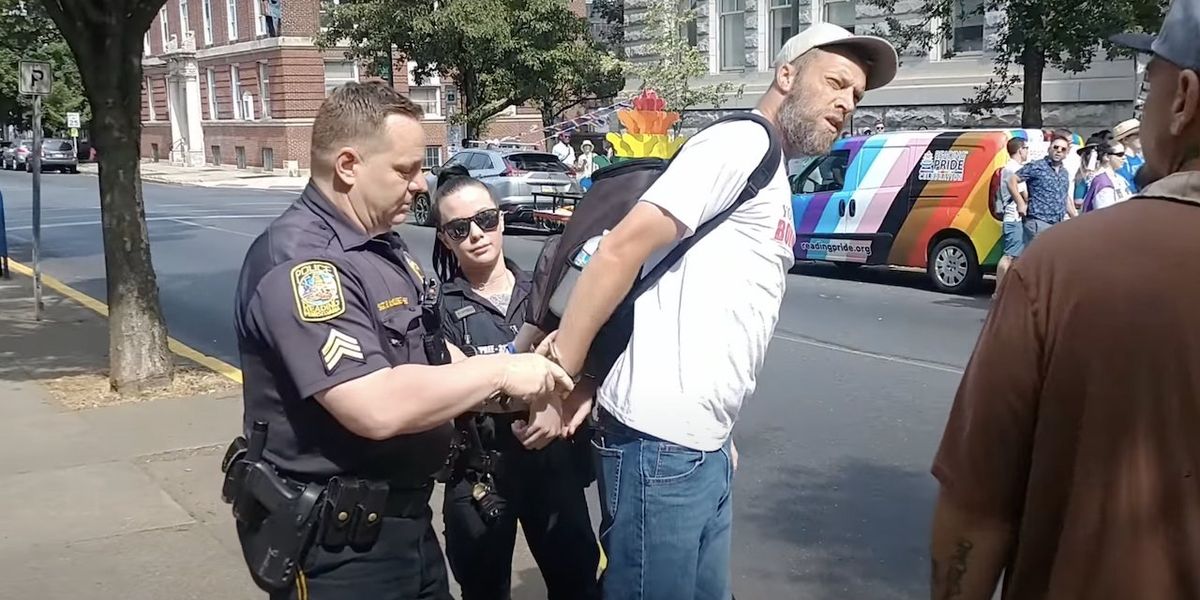 NextImg:Christian arrested after trying to quote Bible to Pride rally attendees sues city for violating his constitutional rights