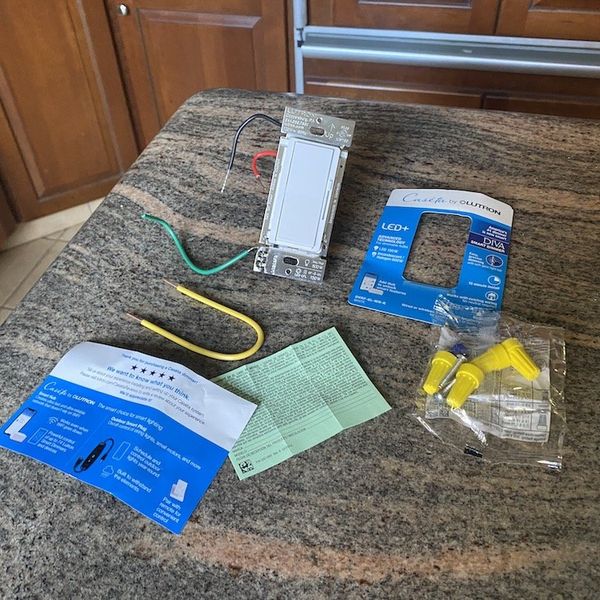 a photo of Lutron Diva Smart Dimmer Switch unboxed