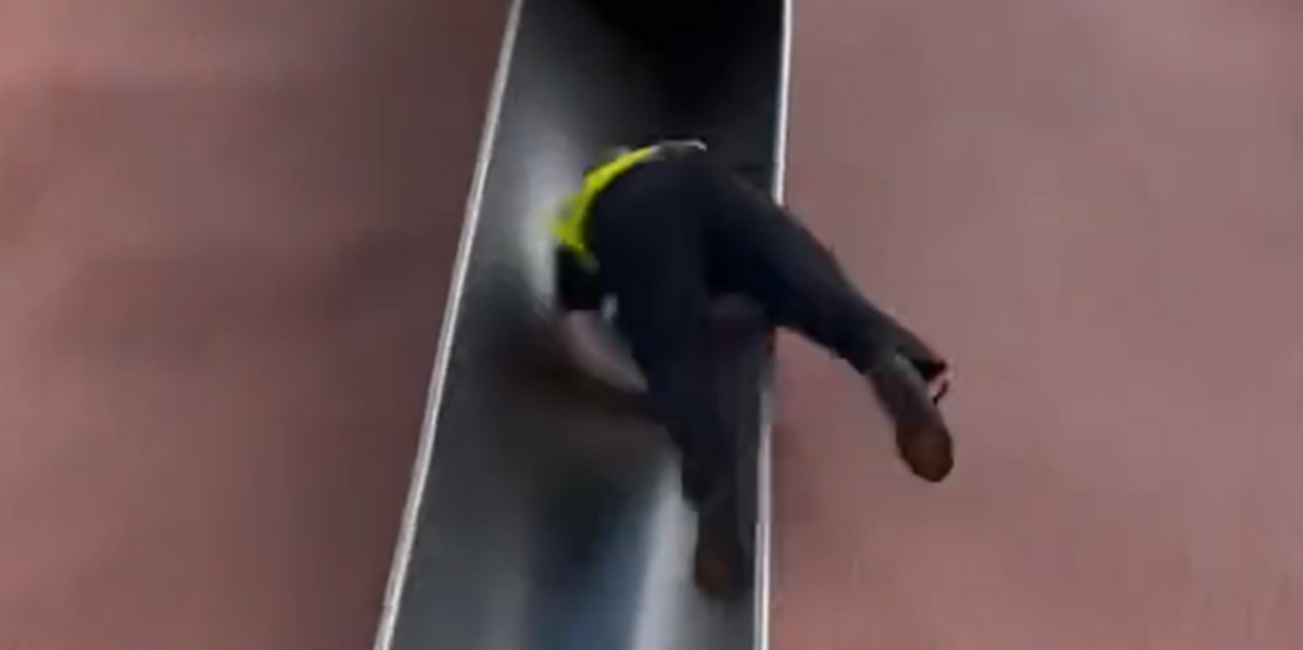 NextImg:On-duty Boston cop gets hurt barreling down massive slide, while his equipment flies: 'Oh f***'