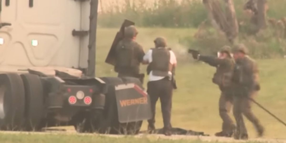 NextImg:Ohio traffic stop goes sideways after couple takes a trucker hostage, then leads police on a 3-hour police chase, ending in gunfire and blood